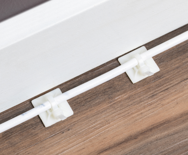 The adhesive on the mount is strong enough to hold the cable tie in place, but can also be easily removed without damaging the surface. Adhesive cable tie mounts are commonly used in a variety of applications, including networking, automotive, and home theater installations.